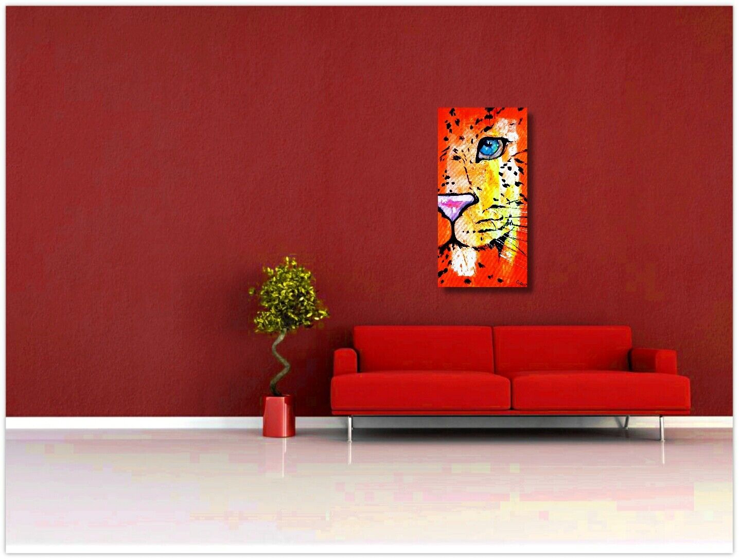 a red couch in front of a red wall 